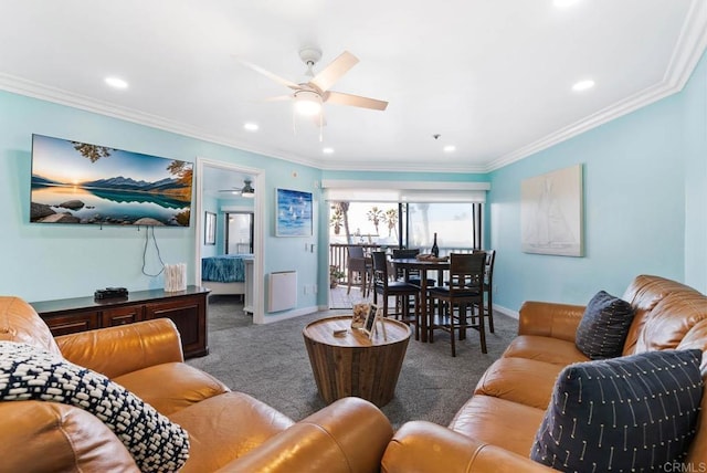 carpeted living room featuring crown molding and ceiling fan