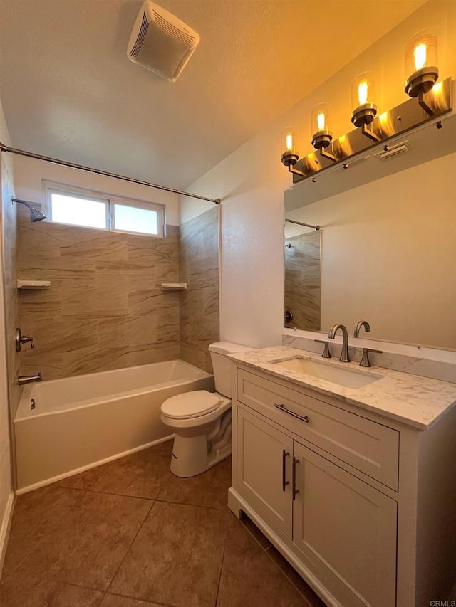 full bath featuring visible vents, toilet, vanity, shower / tub combination, and tile patterned flooring