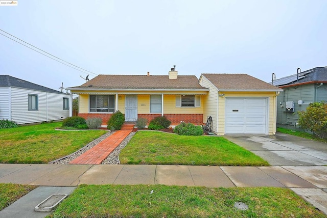 single story home with a garage and a front lawn