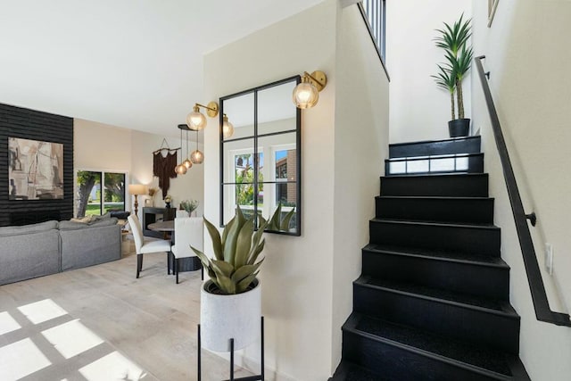 stairway featuring hardwood / wood-style flooring