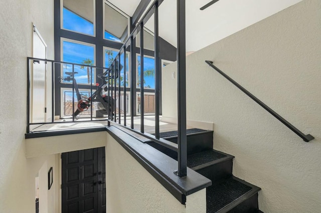 stairway with a high ceiling