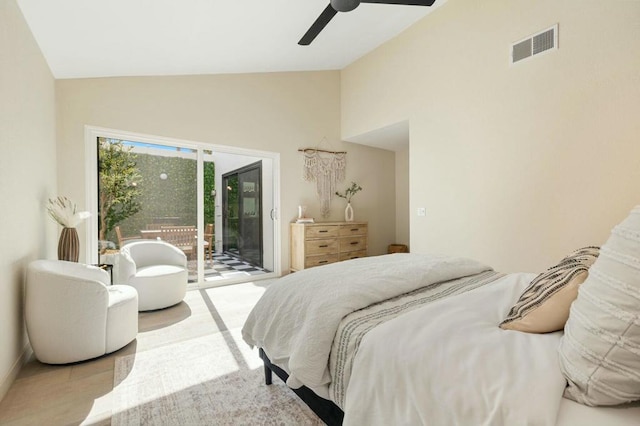 bedroom featuring lofted ceiling, access to exterior, and ceiling fan