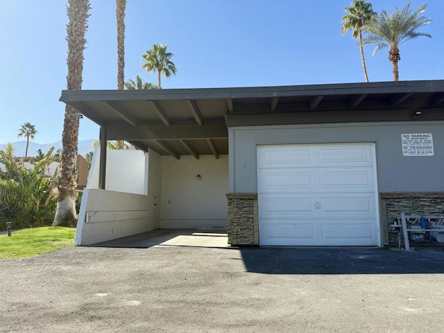 garage with a carport