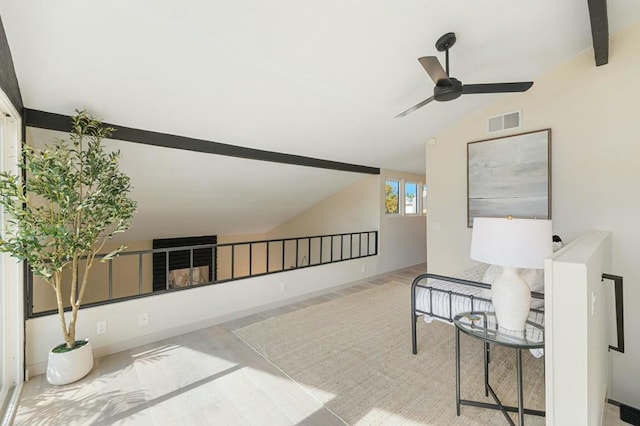 interior space with lofted ceiling and hardwood / wood-style flooring