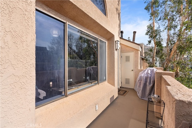 exterior space featuring a balcony