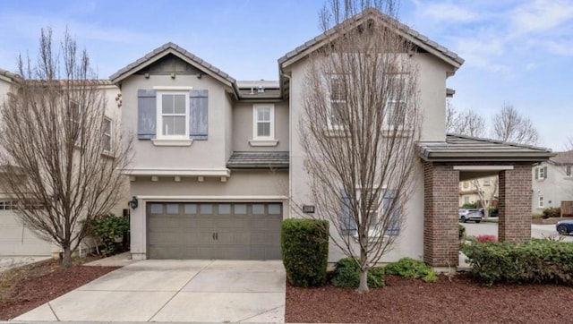 view of front of property featuring a garage