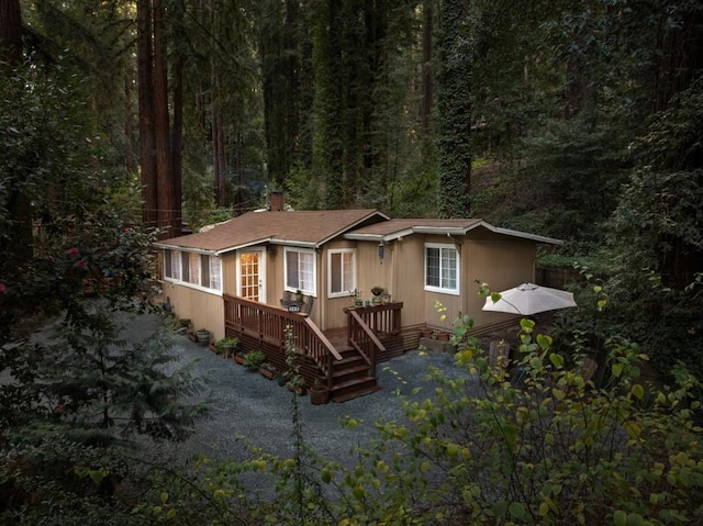 view of front of house featuring a deck