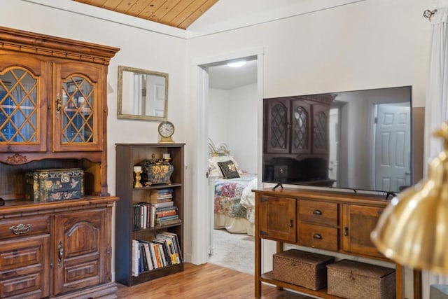 sitting room featuring wood ceiling, lofted ceiling, and light hardwood / wood-style flooring