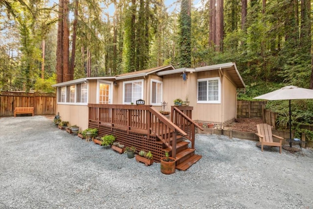 view of front of house with a wooden deck