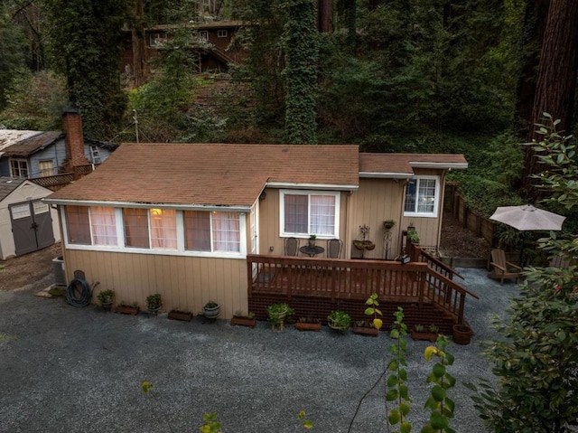 view of front of home featuring a wooden deck