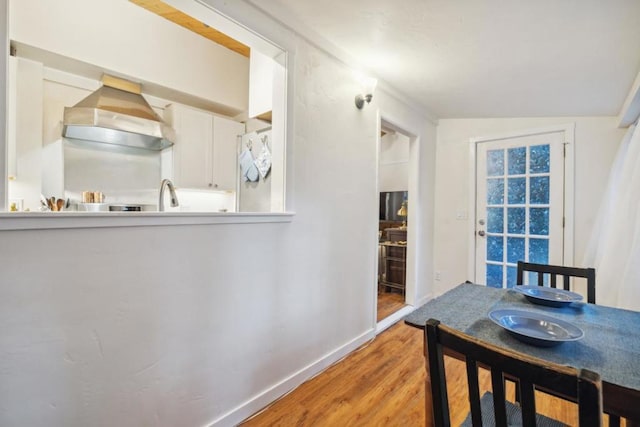 dining room featuring light wood-type flooring