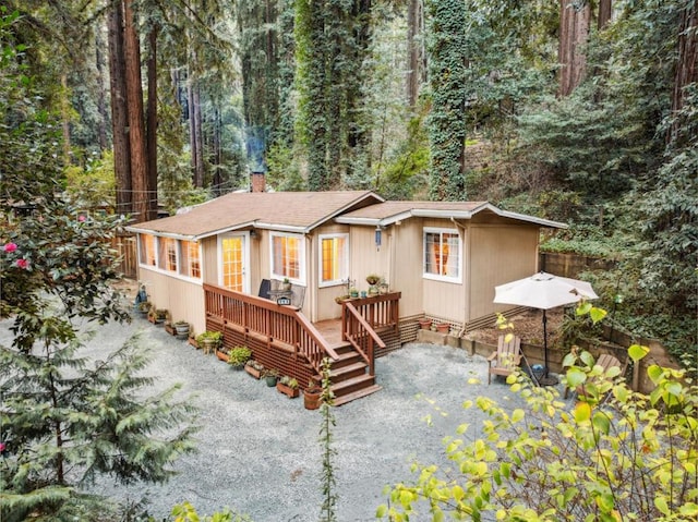 view of front of house with a wooden deck