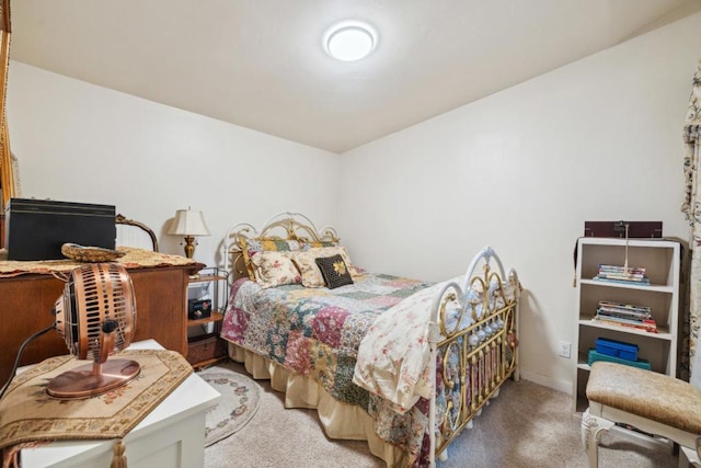 bedroom featuring carpet