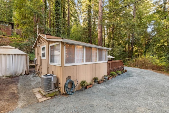 view of outbuilding with central AC unit