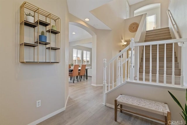 stairway featuring hardwood / wood-style flooring