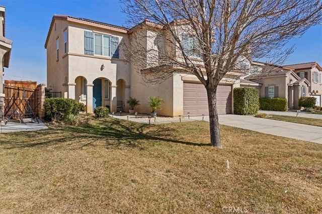 view of front of house featuring a garage and a front lawn