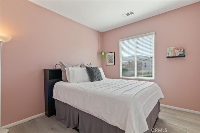 bedroom featuring light hardwood / wood-style flooring