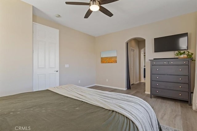 bedroom featuring hardwood / wood-style floors and ceiling fan