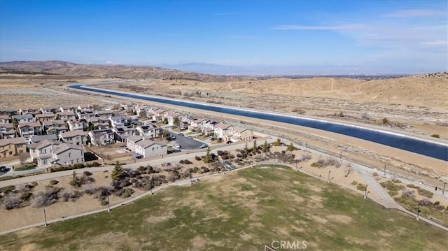 drone / aerial view featuring a mountain view