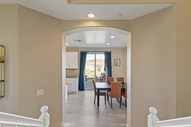 dining room featuring light wood-type flooring