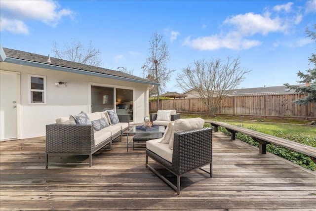 wooden deck featuring an outdoor living space