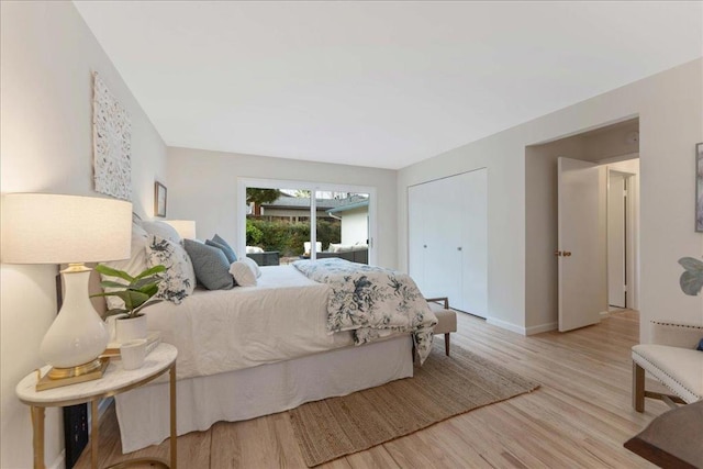 bedroom with light hardwood / wood-style flooring