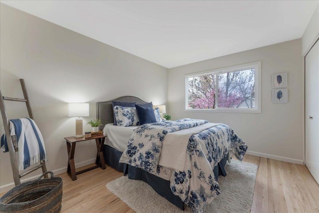 bedroom featuring light wood-type flooring