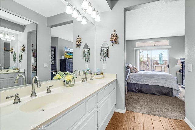 24982 La Pantera, Laguna Niguel, CA 92677 - bathroom with wood finished floors, double vanity, ensuite bathroom, and a sink