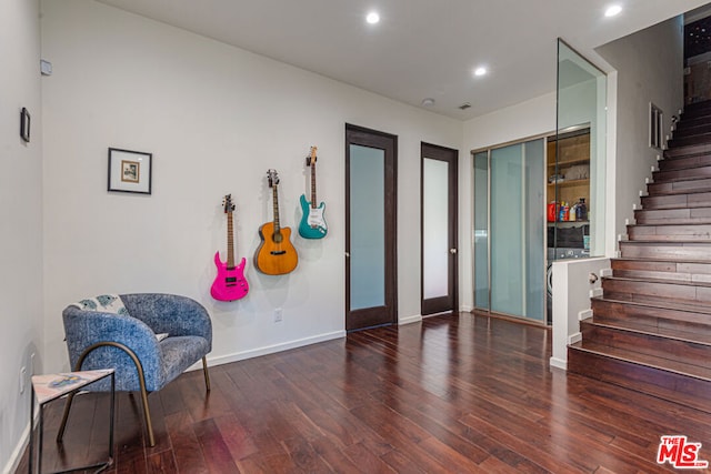 living area featuring dark hardwood / wood-style flooring