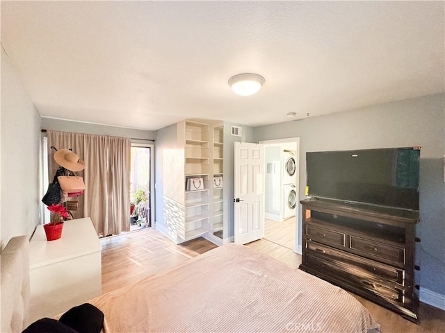 bedroom with light wood-type flooring