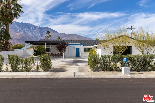 view of front facade featuring a mountain view