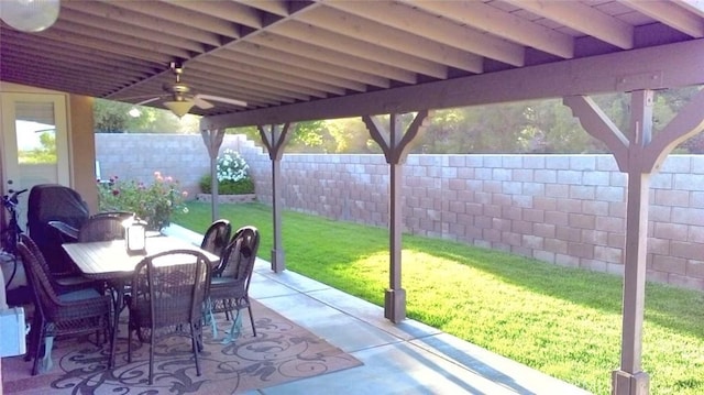 view of patio featuring ceiling fan