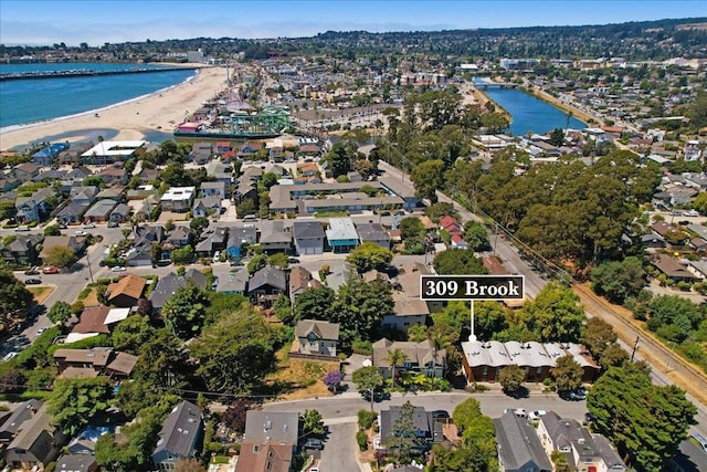 aerial view with a view of the beach and a water view