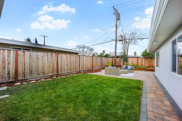 view of yard featuring outdoor lounge area and a patio