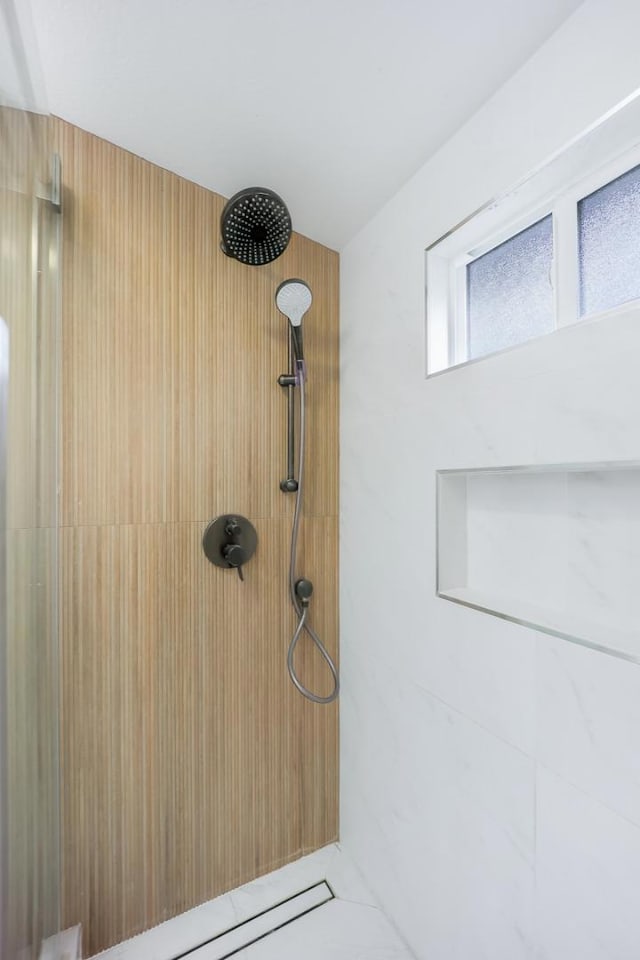 bathroom featuring walk in shower