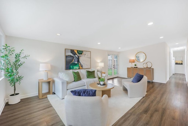 living room featuring french doors and hardwood / wood-style floors