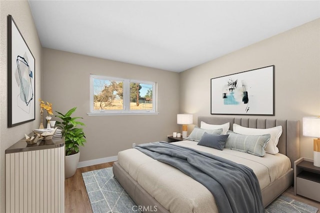 bedroom with light wood-type flooring