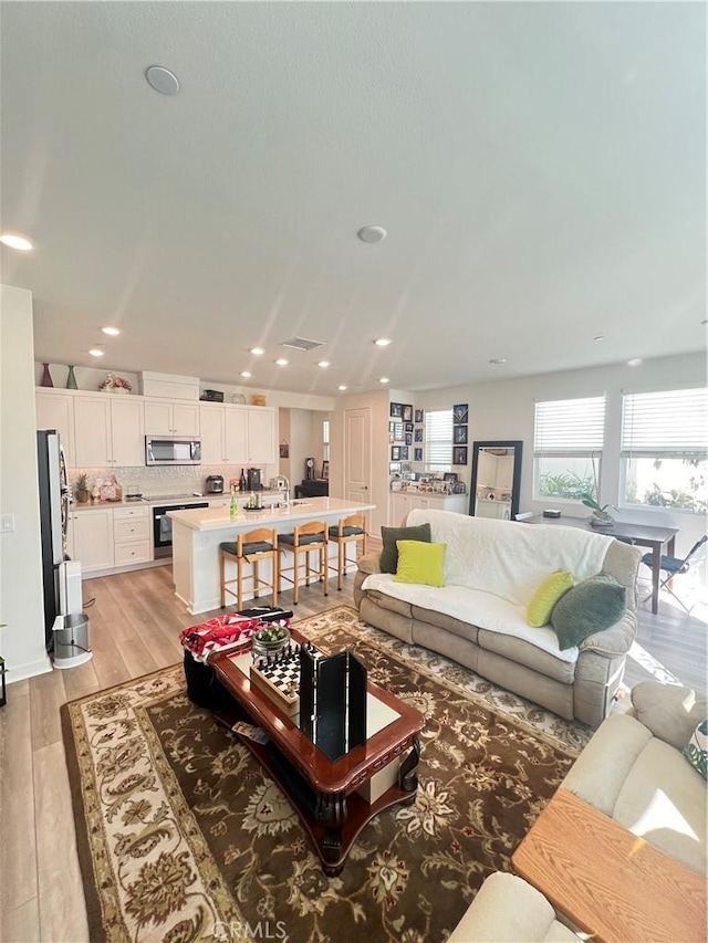 living room featuring light hardwood / wood-style flooring