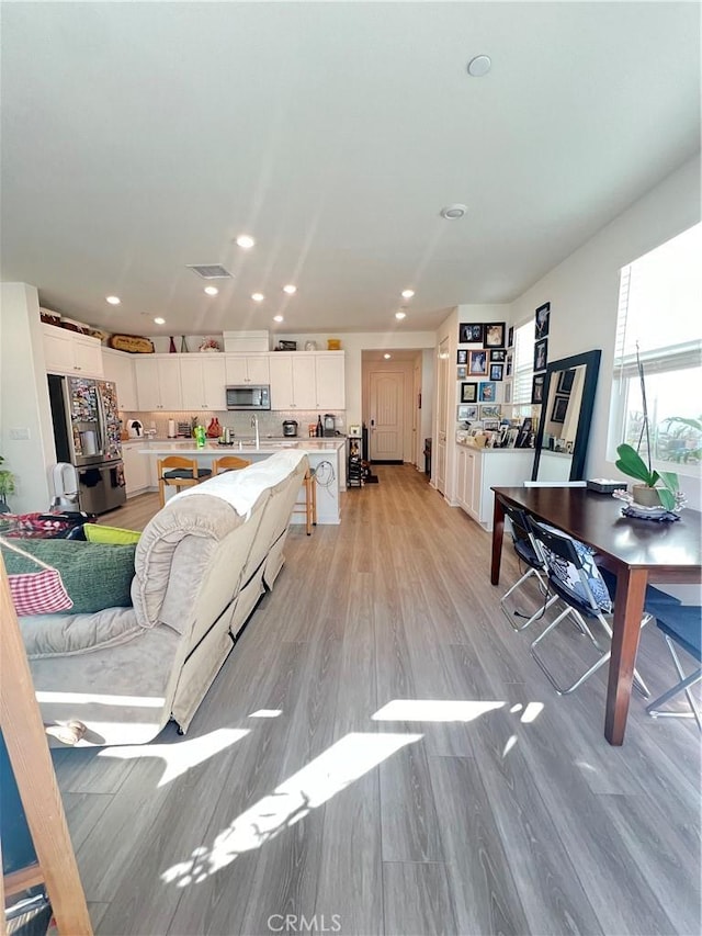 living room featuring light hardwood / wood-style flooring