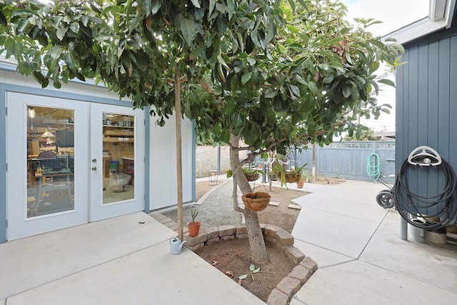 view of patio / terrace featuring french doors and a fenced backyard