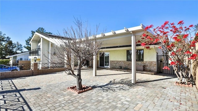 exterior space with a balcony