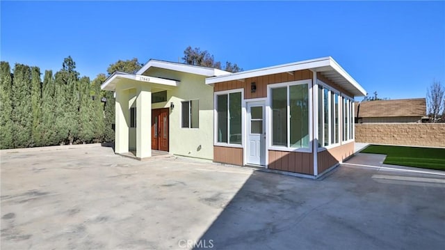 rear view of house featuring a patio area