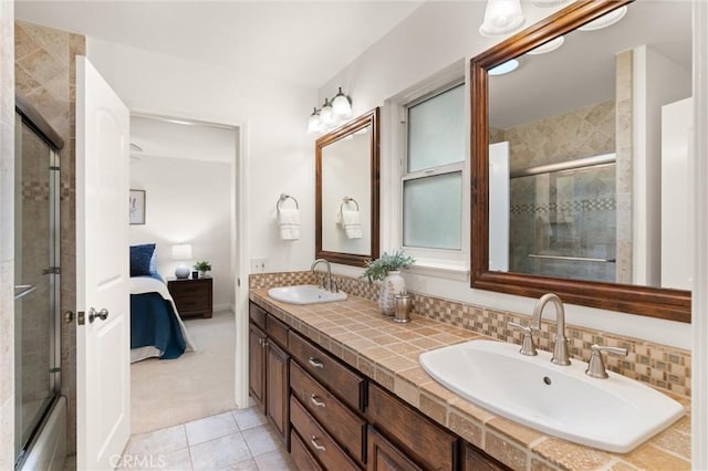 bathroom with tile patterned flooring and vanity