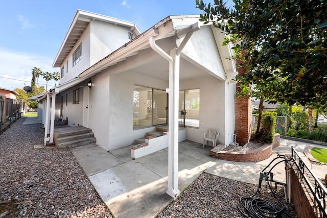 rear view of house with a patio area