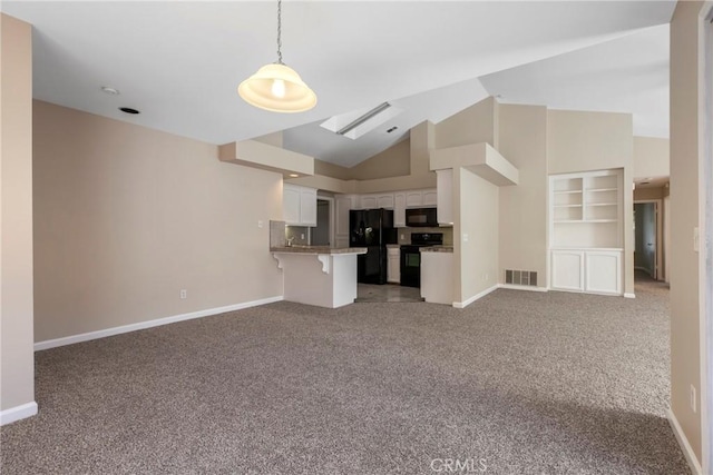 unfurnished living room featuring high vaulted ceiling and carpet floors