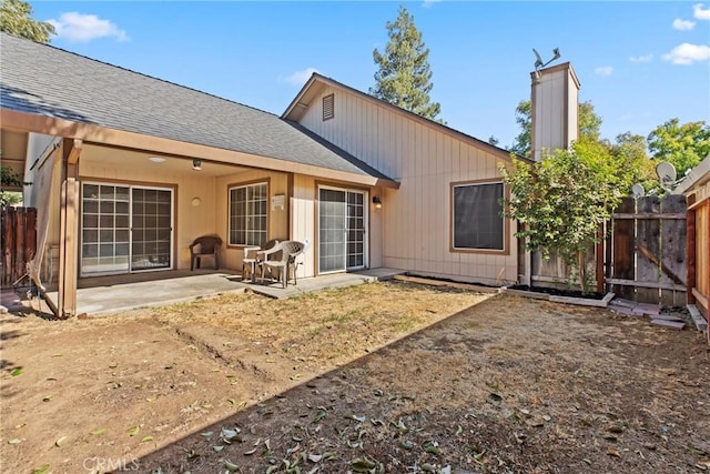 back of house featuring a patio area