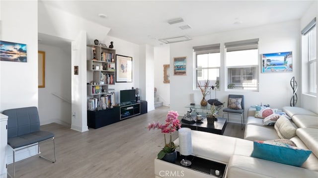 living room featuring light wood-type flooring