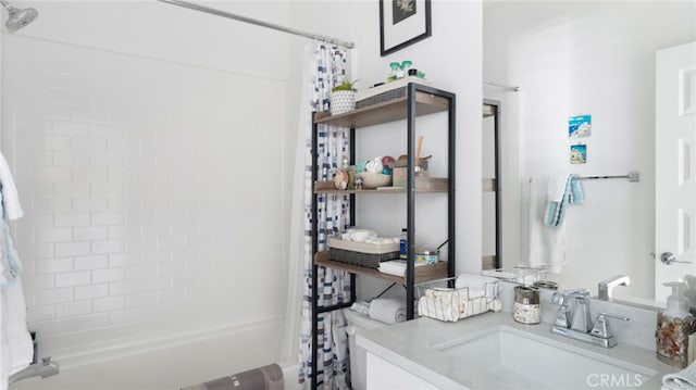 bathroom with vanity and shower / bath combination with curtain