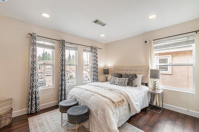 bedroom featuring dark hardwood / wood-style flooring