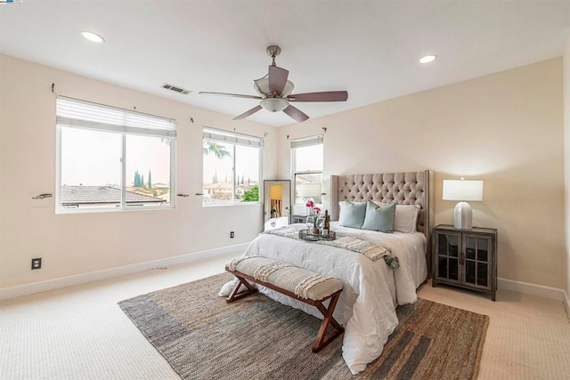 carpeted bedroom featuring ceiling fan